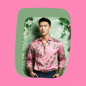 asian man with silk shirt with flower decals