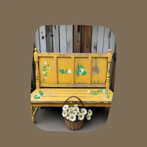 lily floral decals on yellow rustic bench outdoors